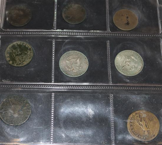 An album of British and European coins, including silver coinage